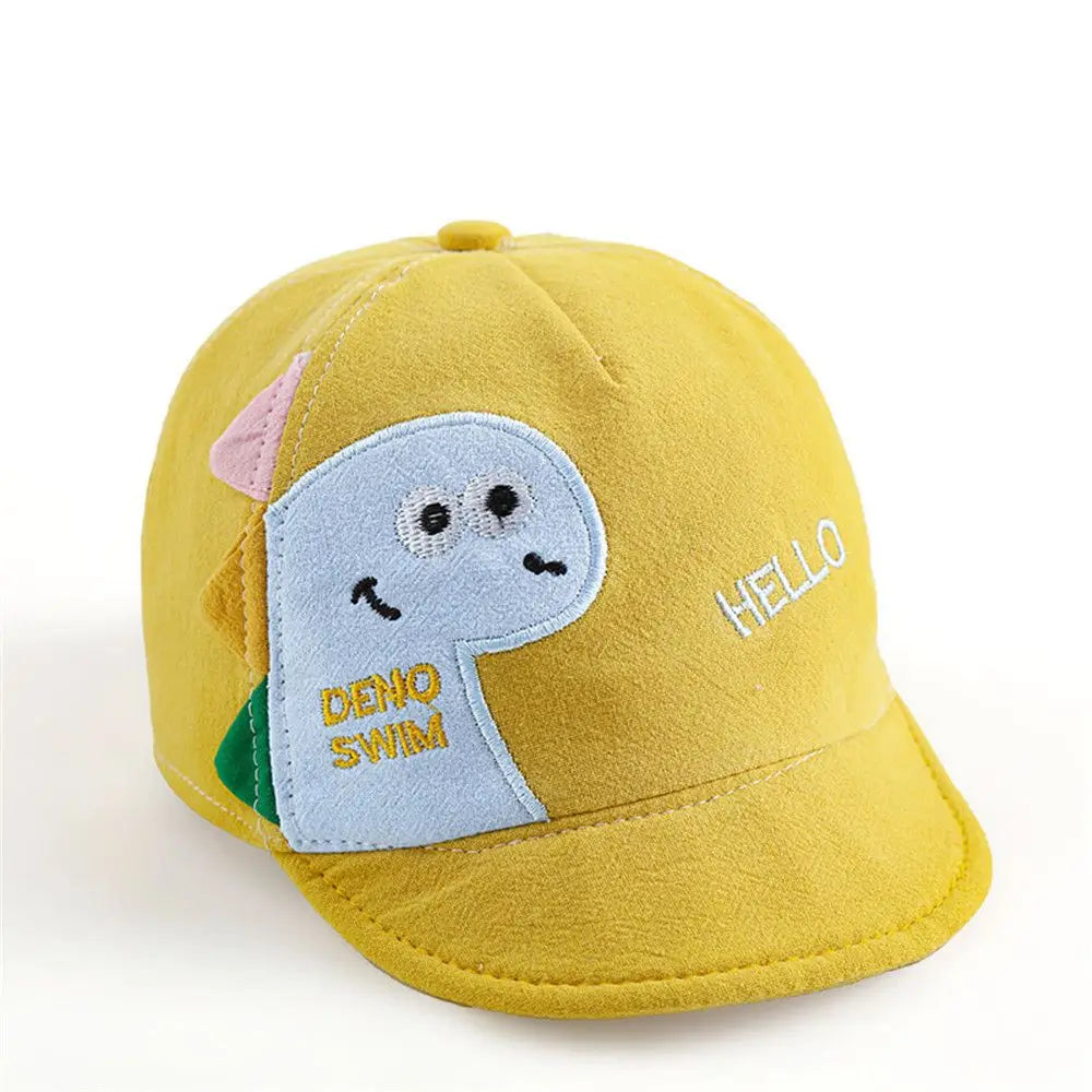 casquette bébé avec dessin de dinosaure