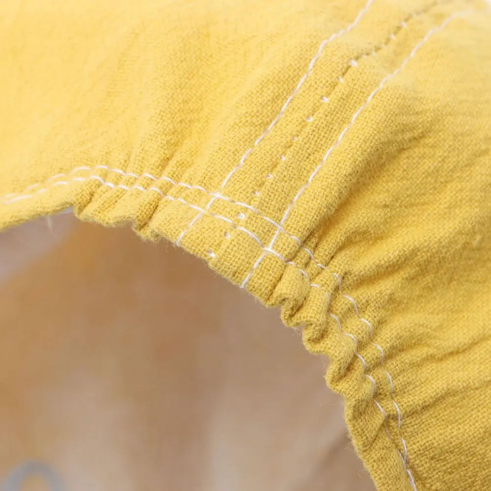 Casquette bébé avec motif de dinosaure