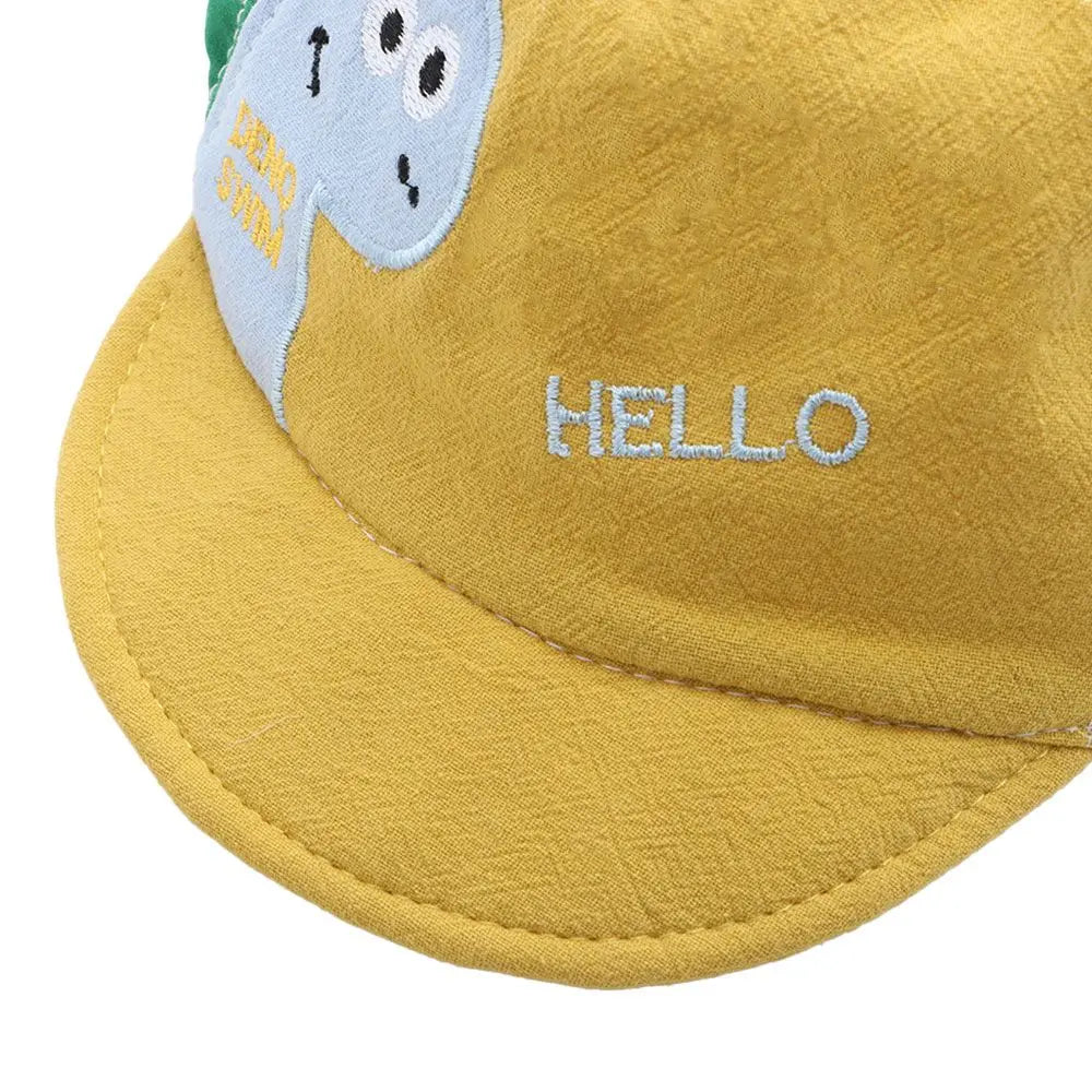 casquette bébé motif dinosaure